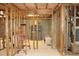 Unfinished basement featuring exposed wood framing; ready for your personal design touches at 912 Tanners Point Dr, Lawrenceville, GA 30044