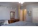 A primary bedroom with a four poster bed, closet, and plenty of space at 912 Tanners Point Dr, Lawrenceville, GA 30044