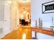 Bright entryway with hardwood floors, white trim, and inviting view into the living room at 912 Tanners Point Dr, Lawrenceville, GA 30044