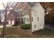 Two-story home with brick and siding, complemented by a well-kept lawn and mature trees at 912 Tanners Point Dr, Lawrenceville, GA 30044
