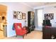 Home office with a bright room, an accent chair, and a modern desk setup at 912 Tanners Point Dr, Lawrenceville, GA 30044