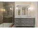 Stylish bathroom with a spacious shower, double vanity, and contemporary design at 281 15Th Ne St # 101, Atlanta, GA 30309