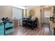 Dining room with a table and chairs, a window with blinds, and laminate flooring at 1143 Forest Villa Nw Dr, Conyers, GA 30012