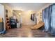 Inviting living room featuring laminate floors, and a staircase at 1143 Forest Villa Nw Dr, Conyers, GA 30012