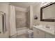 Well-lit bathroom with a shower-tub combo, vanity, and decorative accents at 2160 Kensington Gates Nw Dr, Kennesaw, GA 30152
