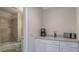 Bathroom/kitchenette with a shower-tub combo, vanity, and kitchenette counter at 2160 Kensington Gates Nw Dr, Kennesaw, GA 30152