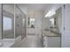 Bright bathroom with a glass enclosed shower and granite counters at 2160 Kensington Gates Nw Dr, Kennesaw, GA 30152