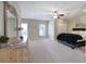 Spacious bedroom with a ceiling fan, double closets, and a neutral color palette at 2160 Kensington Gates Nw Dr, Kennesaw, GA 30152