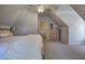 Bedroom featuring a ceiling fan, carpeting and a chest of drawers at 2160 Kensington Gates Nw Dr, Kennesaw, GA 30152
