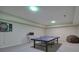 Recreational room with a ping pong table, dart board, and ample space for entertainment at 2160 Kensington Gates Nw Dr, Kennesaw, GA 30152