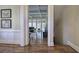 View into living room featuring wood flooring and coffered ceilings at 2160 Kensington Gates Nw Dr, Kennesaw, GA 30152