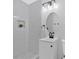 Bathroom featuring a walk-in shower, toilet, and mirror at 3679 Mill Glen Dr, Douglasville, GA 30135