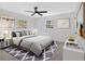 Nicely decorated bedroom with a bed, paintings, and bedside tables at 3679 Mill Glen Dr, Douglasville, GA 30135