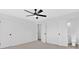 Bedroom features a ceiling fan and access to a bathroom at 3679 Mill Glen Dr, Douglasville, GA 30135