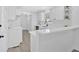 Kitchen featuring white cabinets, sleek hardware, stainless steel appliances, and light wood flooring at 3679 Mill Glen Dr, Douglasville, GA 30135