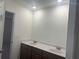 Bathroom featuring double sinks and a clean, modern design at 220 Bloomfield Cir, Canton, GA 30114