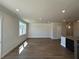 Expansive living area featuring wood floors and neutral paint, creating a serene space at 254 Depot Landing Rd # 55, Auburn, GA 30011