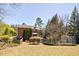 Expansive backyard with lush greenery offers ample space for recreation and relaxation at 1364 Manget Way, Dunwoody, GA 30338