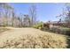 Well-maintained backyard with a large grassy area provides a serene outdoor setting at 1364 Manget Way, Dunwoody, GA 30338