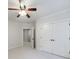 Bright bedroom boasts new carpet, fresh paint, and double doors adding space at 1364 Manget Way, Dunwoody, GA 30338