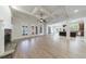 Spacious living room with stone fireplace, coffered ceiling and french doors to the backyard at 1364 Manget Way, Dunwoody, GA 30338