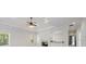 Open living room features a fireplace, wet bar area, and natural light at 1364 Manget Way, Dunwoody, GA 30338