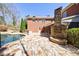 Backyard view of the large in-ground pool and lush landscaping for privacy at 1364 Manget Way, Dunwoody, GA 30338
