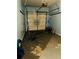 Spacious garage featuring a secure door and ample storage space at 47 Trailside Cir, Hiram, GA 30141