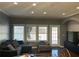 Comfortable living room featuring natural light, stylish furniture, and modern decor at 47 Trailside Cir, Hiram, GA 30141