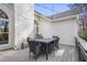 Spacious wooden deck with black patio furniture, perfect for outdoor dining at 549 Trailwood Sw Ln, Marietta, GA 30064