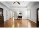 Spacious main bedroom with hardwood floors, tray ceiling, and abundant natural light at 549 Trailwood Sw Ln, Marietta, GA 30064