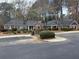 Exterior view of a clubhouse with parking and landscaping at 549 Trailwood Sw Ln, Marietta, GA 30064