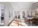 Bright dining room with large windows and access to the outdoor deck at 549 Trailwood Sw Ln, Marietta, GA 30064