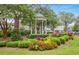 Charming gazebo surrounded by lush landscaping and colorful flowers, inviting relaxation at 549 Trailwood Sw Ln, Marietta, GA 30064
