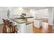 Open kitchen design with breakfast bar seating and granite countertops at 549 Trailwood Sw Ln, Marietta, GA 30064