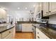 Modern kitchen featuring granite countertops, stainless steel appliances, and hardwood floors at 549 Trailwood Sw Ln, Marietta, GA 30064