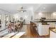 Bright kitchen featuring granite countertops and breakfast bar seating with backyard view at 549 Trailwood Sw Ln, Marietta, GA 30064