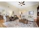 Spacious living room with hardwood floors, neutral paint, and ample seating at 549 Trailwood Sw Ln, Marietta, GA 30064