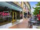 Mac's Chophouse restaurant exterior with golden door and outdoor seating, inviting ambiance at 549 Trailwood Sw Ln, Marietta, GA 30064