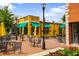 Inviting Red Hare Brewing and Distilling outdoor patio area with seating and vibrant umbrellas at 549 Trailwood Sw Ln, Marietta, GA 30064