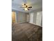 Spacious bedroom with three closets and carpeted floors at 2179 Summertown Dr, Norcross, GA 30071