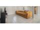 Spacious basement with a large sofa, providing ample seating and entertainment space at 1875 Ebenezer Sw Rd, Conyers, GA 30094