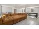 Finished basement area featuring game tables and a large comfortable sectional sofa at 1875 Ebenezer Sw Rd, Conyers, GA 30094