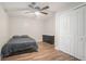 Bedroom with hardwood floors and storage at 1875 Ebenezer Sw Rd, Conyers, GA 30094