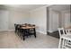 Spacious dining room with neutral tile flooring, ideal for Gathering gatherings and entertaining guests at 1875 Ebenezer Sw Rd, Conyers, GA 30094