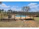 Inviting backyard pool with deck and outdoor dining area perfect for entertaining at 1875 Ebenezer Sw Rd, Conyers, GA 30094