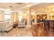 Elegant community room featuring comfortable seating, a bar area, and ample lighting at 230 E Ponce De Leon Ave # 327, Decatur, GA 30030