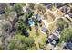 Aerial view showcasing the backyard, pool, and surrounding neighborhood at 695 Old Peachtree Rd, Lawrenceville, GA 30043