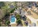 An aerial shot highlighting the home's pool, patio, and well-manicured lawn at 695 Old Peachtree Rd, Lawrenceville, GA 30043
