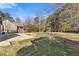 Large backyard with a patio and plenty of space for outdoor activities at 695 Old Peachtree Rd, Lawrenceville, GA 30043